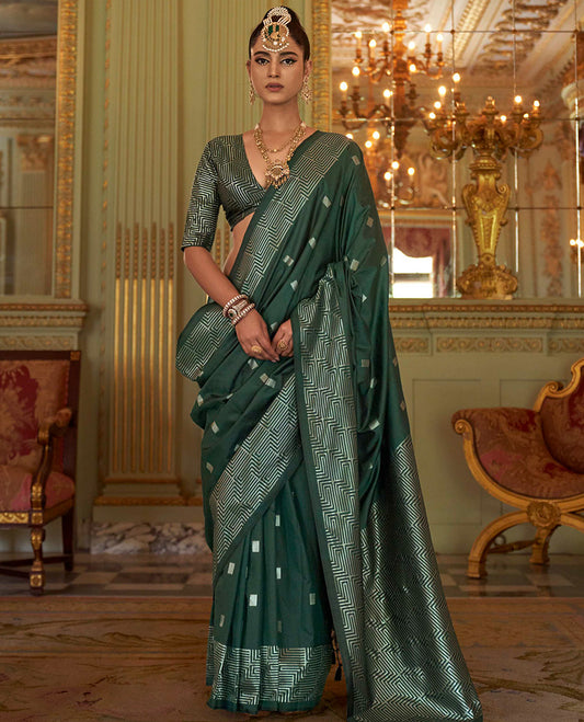 Green Designer Catalog Saree Decked Up with Square Buttas All Over Its Body, Highlighted with a Zari Border of Maze-Like Geometric Patterns, Pallu Mirrors Intricate Maze patterns in Zari, and Paired with a Matching Blouse