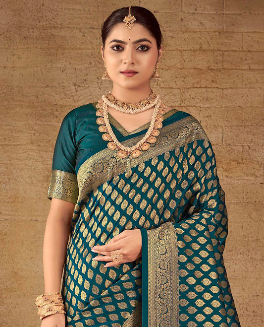 Peacock Blue Semi Banaras Silk Designer Catalog Saree, Delicately Woven with Zari Buttas, Highlighted by a Zari Floral Creeper Border, Pallu of Intricate Designs, and a Matching Blouse