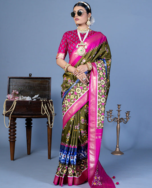 Mehendi green patola floral motifs designer saree, contrast temple border, and patola printed pallu
