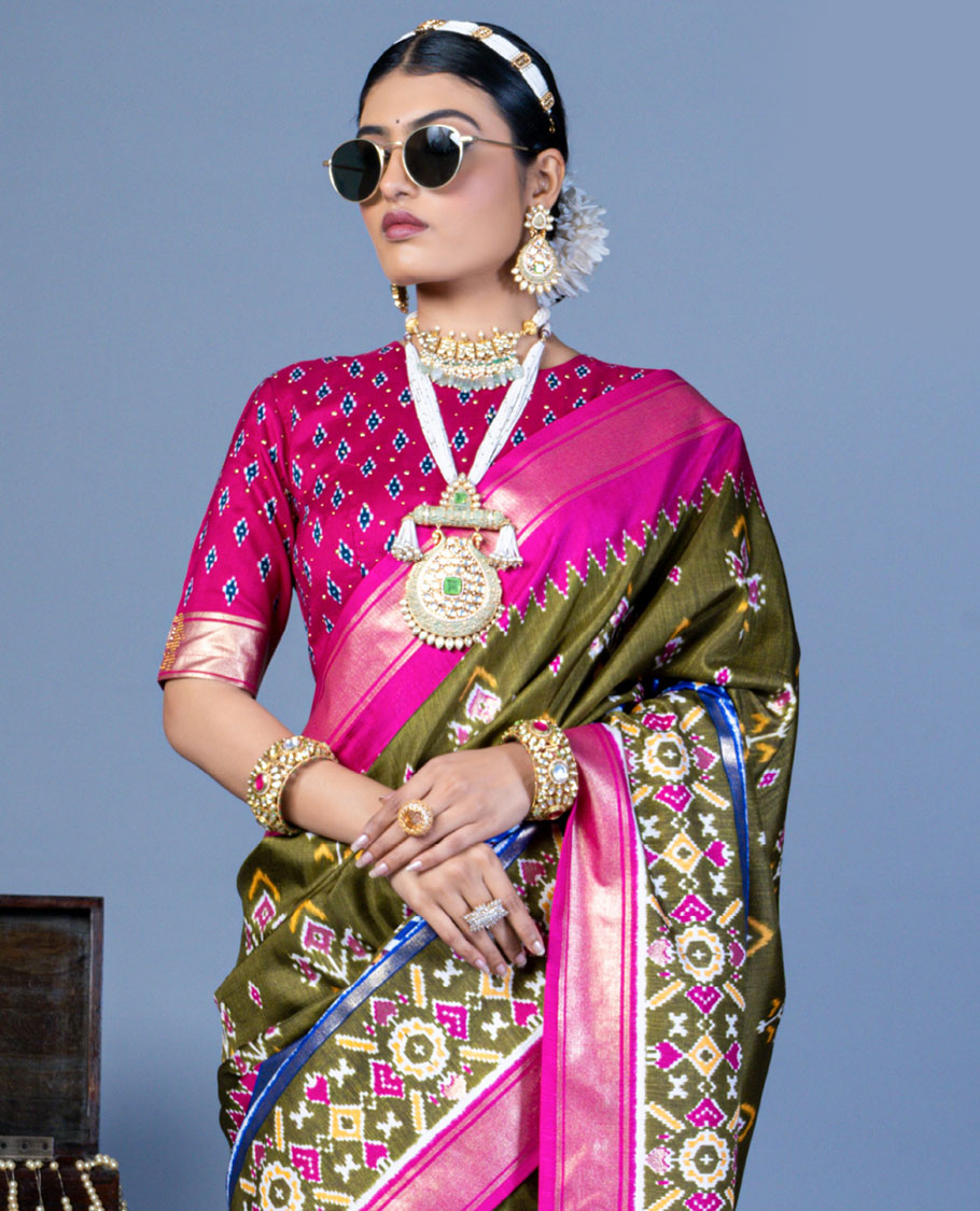 Mehendi green patola floral motifs designer saree, contrast temple border, and patola printed pallu