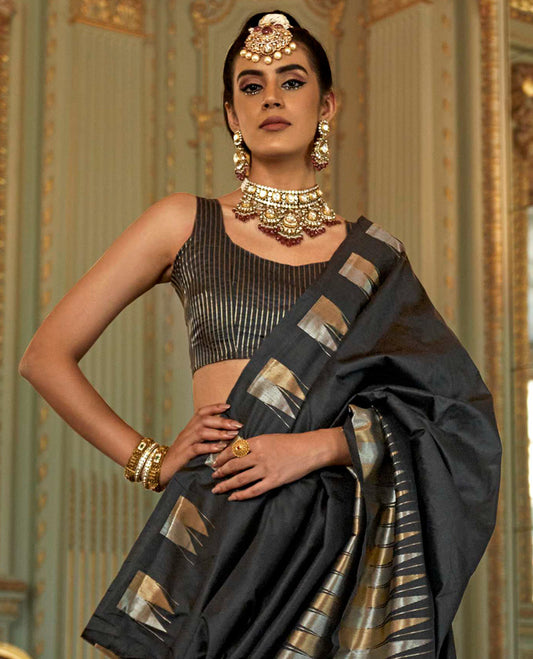 Black Plain Designer Saree, Complemented by a Gleaming Temple Zari Border, Scintillating Zari Decked Up Pallu, and Comes with a Matching Blouse
