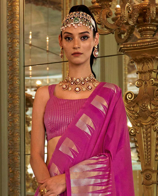 Rani Pink Plain Designer Saree, Complemented by a Gleaming Temple Zari Border, Scintillating Zari Decked Up Pallu, and Comes with a Matching Blouse