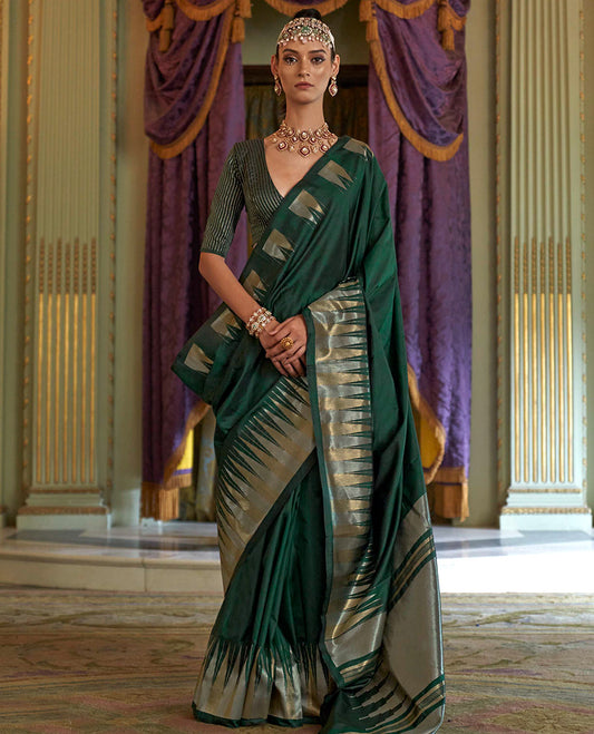 Dark Green Plain Designer Saree, Complemented by a Gleaming Temple Zari Border, Scintillating Zari Decked Up Pallu, and Comes with a Matching Blouse