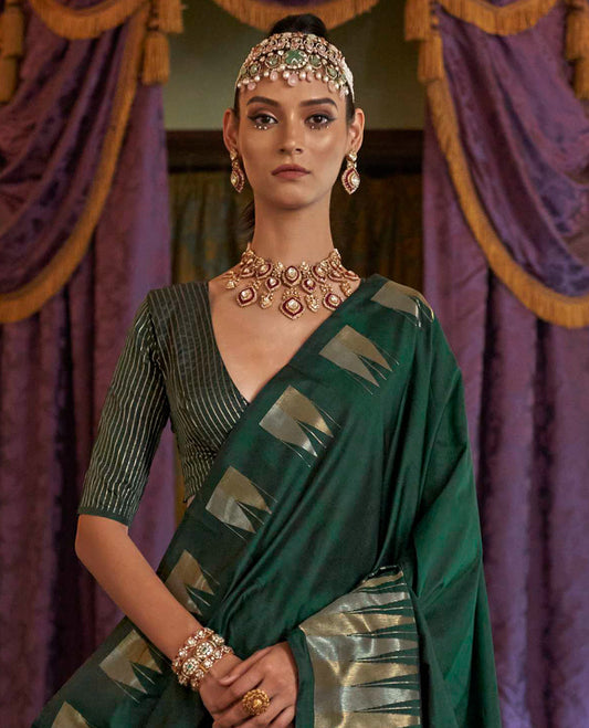 Dark Green Plain Designer Saree, Complemented by a Gleaming Temple Zari Border, Scintillating Zari Decked Up Pallu, and Comes with a Matching Blouse