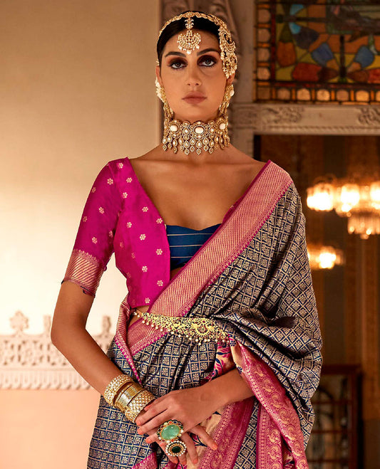 Dark blue jaal-patterned designer catalog saree, contrast traditional motifs border of resham floral designs, and ogee patterned pallu