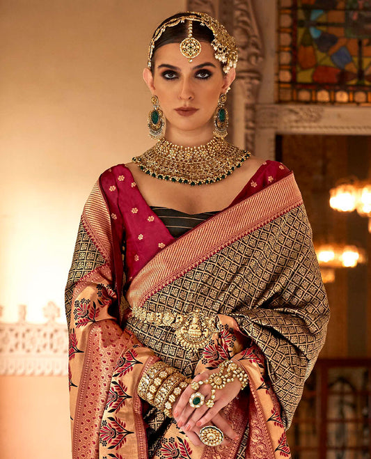 Black jaal-patterned designer catalog saree, contrast traditional motifs border of resham floral designs, and ogee patterned pallu