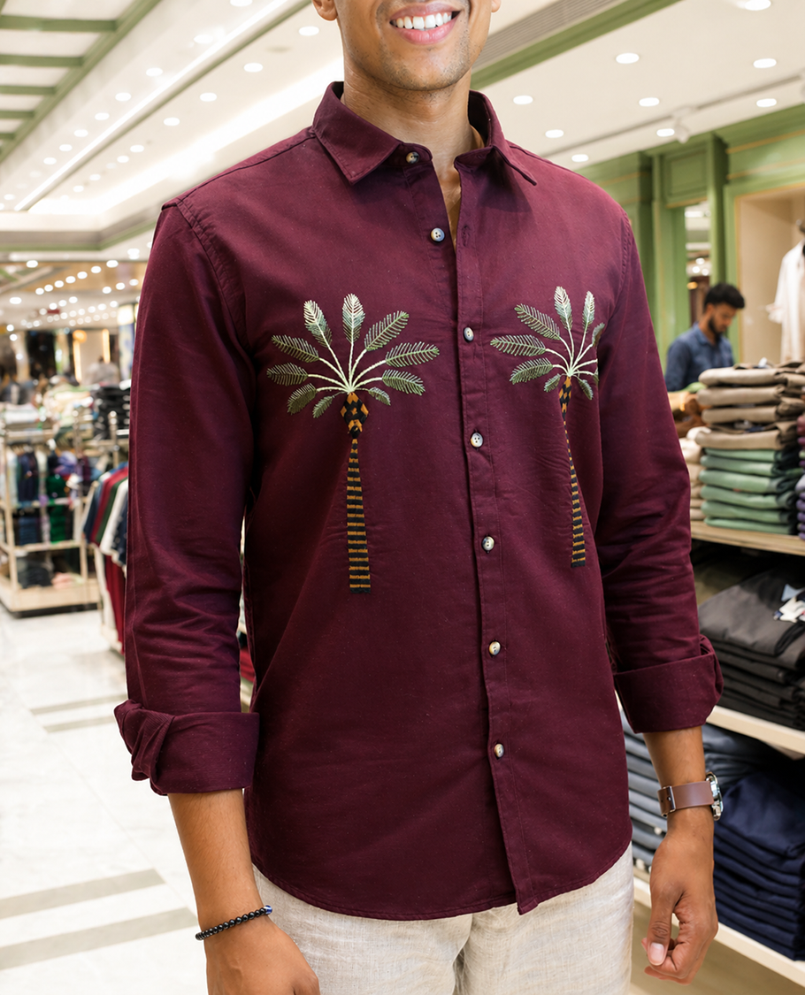 Maroon Cotton-Blended Casual Shirt, Artfully Designed with Palm Tree Motifs Embroidery, Featuring a Spread Collar, Full Sleeves, Slim Fit, and Regular Length