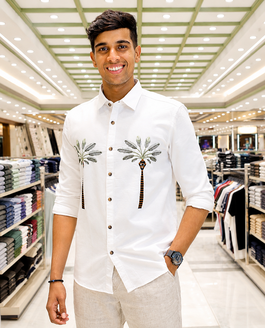 White Cotton-Blended Casual Shirt, Artfully Designed with Palm Tree Motifs Embroidery, Featuring a Spread Collar, Full Sleeves, Slim Fit, and Regular Length