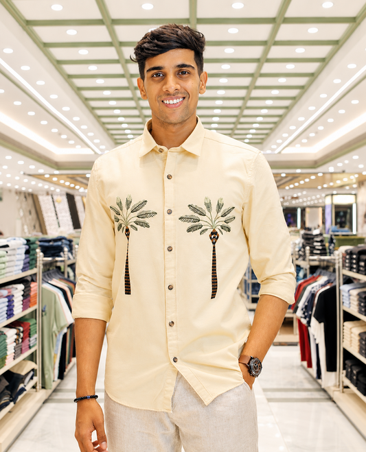 Cream Cotton-Blended Casual Shirt, Artfully Designed with Palm Tree Motifs Embroidery, Featuring a Spread Collar, Full Sleeves, Slim Fit, and Regular Length