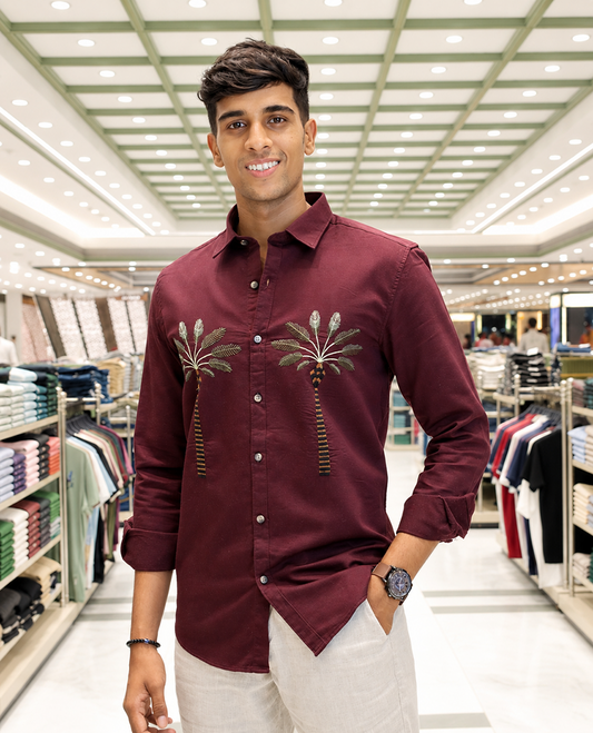 Maroon Cotton-Blended Casual Shirt, Artfully Designed with Palm Tree Motifs Embroidery, Featuring a Spread Collar, Full Sleeves, Slim Fit, and Regular Length