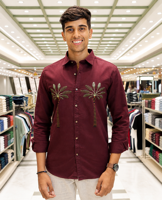 Maroon Cotton-Blended Casual Shirt, Artfully Designed with Palm Tree Motifs Embroidery, Featuring a Spread Collar, Full Sleeves, Slim Fit, and Regular Length