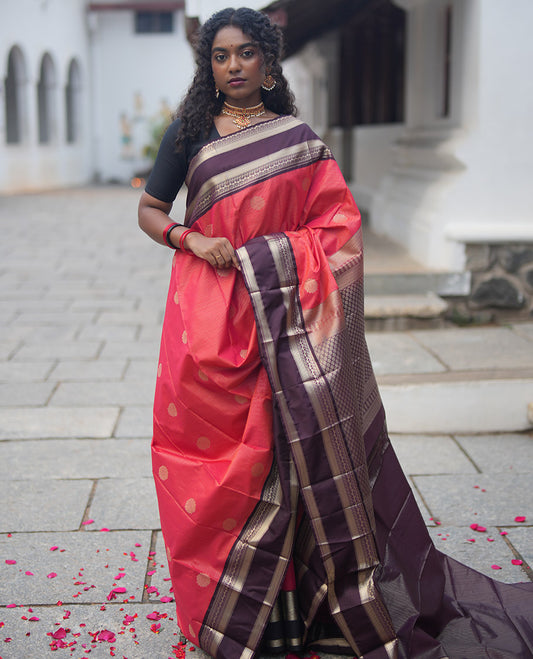 Reddish Orange and Coffee Brown Budget Silk Saree, Ornamented With Zari Buttas and Vaira Oosai Stripes All Over Its Body, Complemented by Contrast Traditional Zari Rettai Pettu Border, Grand Pallu, and Paired with a Contrast Blouse