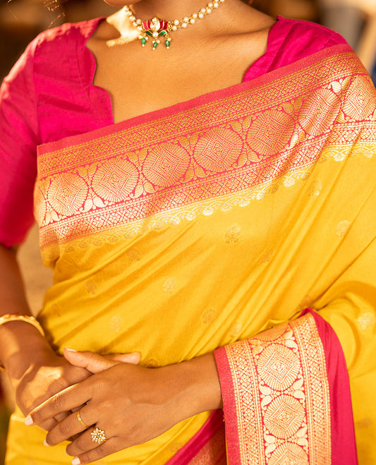 Mustard Yellow Dupion Silk Saree, Embellished with Buttas All Over Its Body, Complemented by Contrast Traditional Border of Paisleys and Chakram Designs, Intricately Designed Pallu, and Paired with a Contrast Blouse