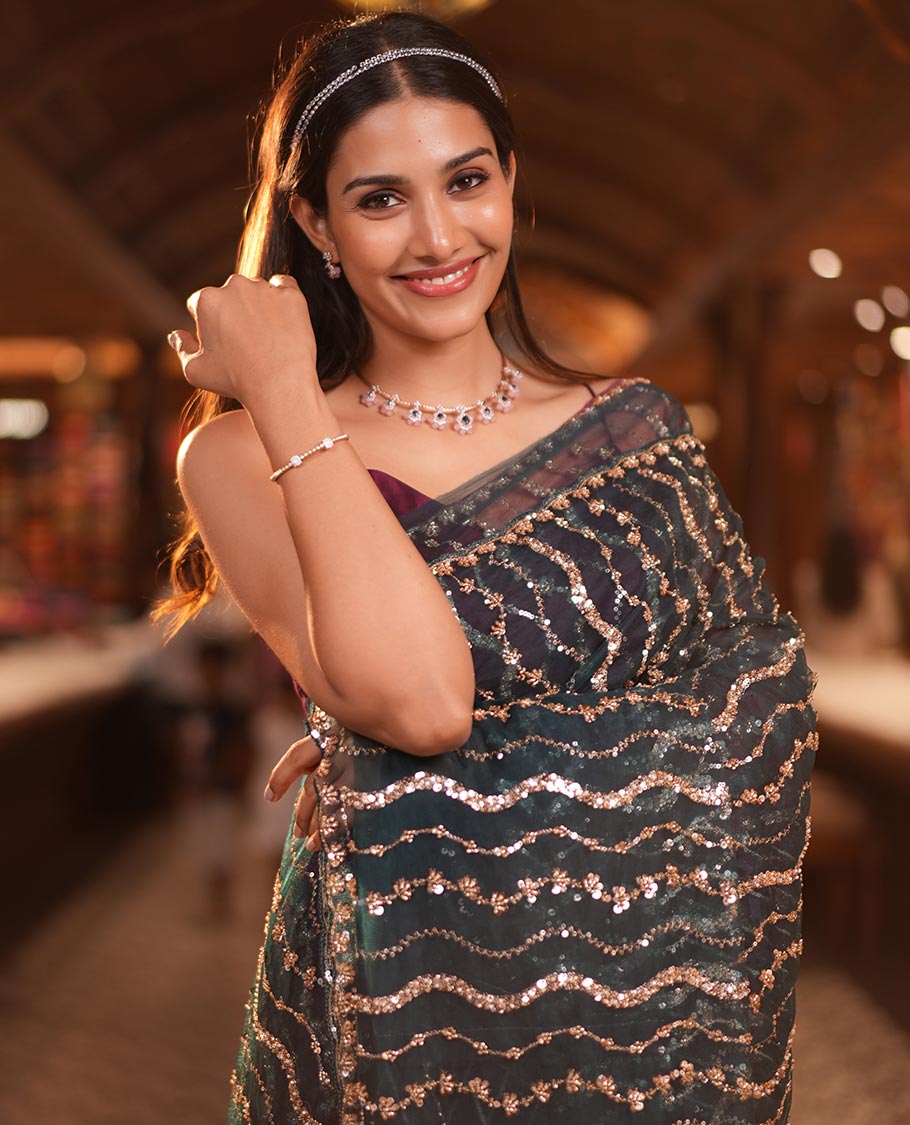 Teal Blue Zig-Zag Sequin Striped Net Designer Saree with a Matching Blouse