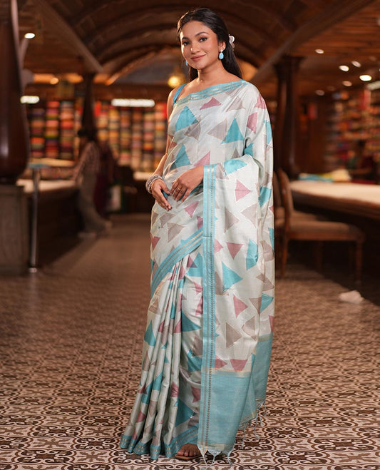 Sky Blue Fancy Tussar Silk Saree Features Triangle Motifs, Zari Border, Striped Pallu, Matching Blouse
