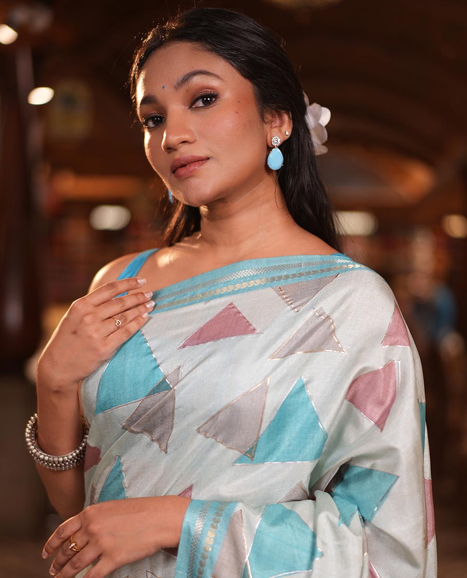 Sky Blue Fancy Tussar Silk Saree Features Triangle Motifs, Zari Border, Striped Pallu, Matching Blouse