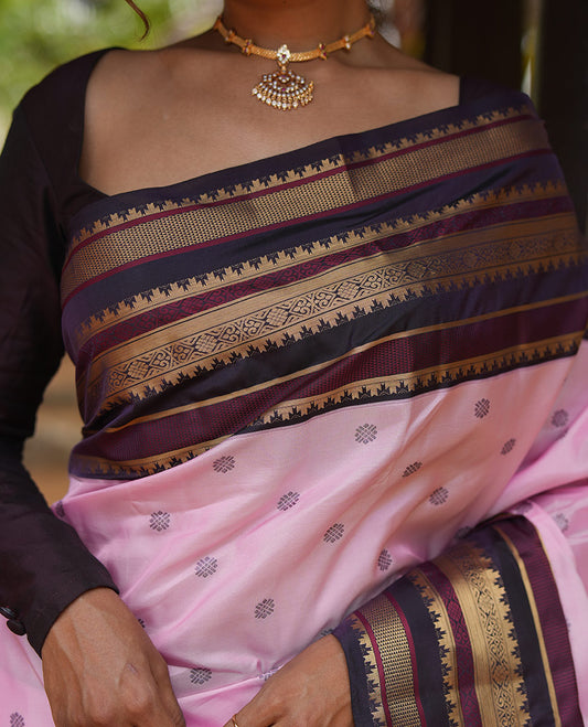 Baby Pink and Coffee Brown Vasundhara Lite Silk Mix Saree, Subtly Adorned with Buttas All Over Its Body, Complemented by Contrast Border of Thazampoo Rekku, Banaras, Jada Nagam, and Ara Maadam Designs, Grand Pallu, and Paired with a Contrast Blouse