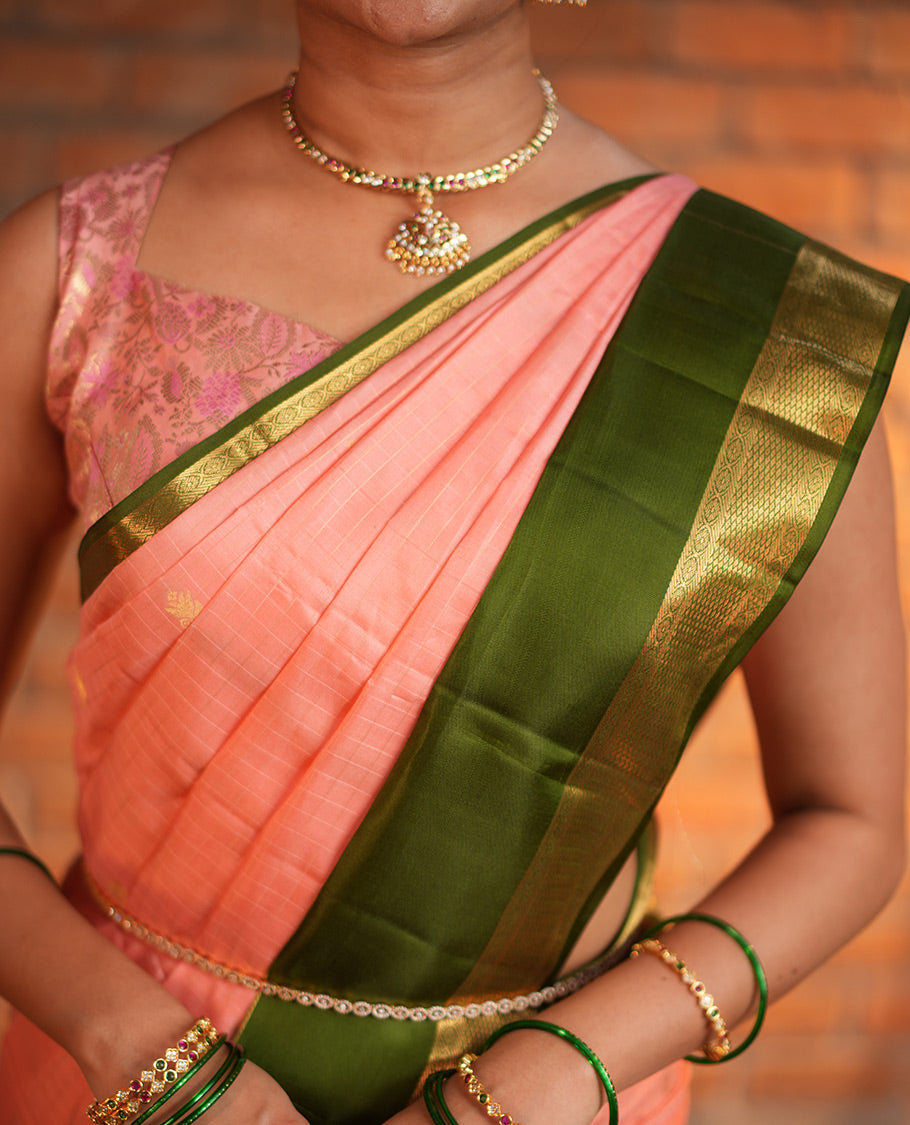 Pink Vasundhara Silk Saree, Finely Crafted with Zari Buttas and Checked Design, Complemented by a Contrast One-Sided Rettai Pettu Border of Rekku, Laddu Kamalam, Mayil Kann and Kodi Visiry Designs, Grand Jaal Pallu, and Paired with a Contrast Blouse