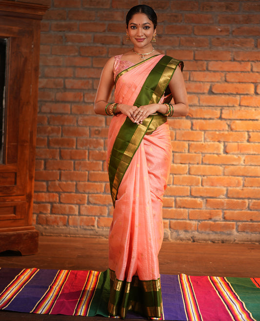 Pink Vasundhara Silk Saree, Finely Crafted with Zari Buttas and Checked Design, Complemented by a Contrast One-Sided Rettai Pettu Border of Rekku, Laddu Kamalam, Mayil Kann and Kodi Visiry Designs, Grand Jaal Pallu, and Paired with a Contrast Blouse