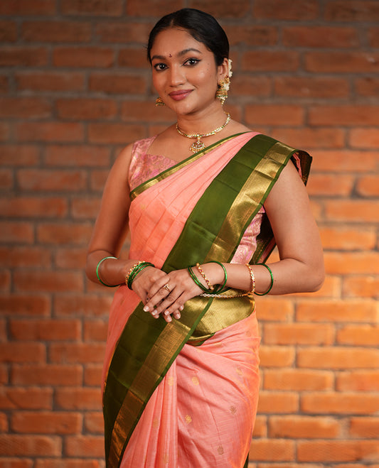 Pink Vasundhara Silk Saree, Finely Crafted with Zari Buttas and Checked Design, Complemented by a Contrast One-Sided Rettai Pettu Border of Rekku, Laddu Kamalam, Mayil Kann and Kodi Visiry Designs, Grand Jaal Pallu, and Paired with a Contrast Blouse