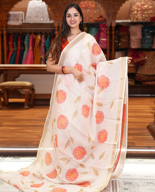 Cream Linen Cotton Saree with Unique Floral Print, a Gold Zari Border, a Contrast Blouse