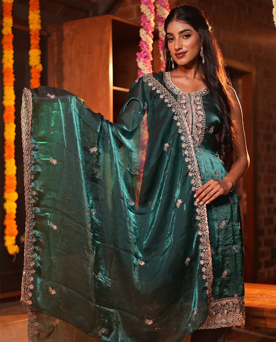 Peacock Green Fendi Organza Material Churidar Features Embroidered Top, a Santoon Bottom, a Scallop Embroidered Dupatta