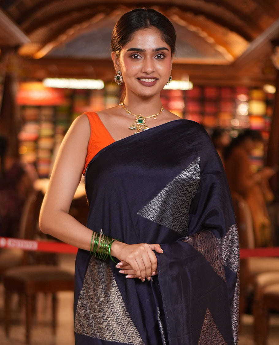 Borderless Navy Blue Chanderi Cotton Saree, Richly Detailed with Zari Triangle Motifs Steeped All Over Its Body, Highlighted by Grand Zari Rich Pallu, and Paired with a Matching Brocade Blouse