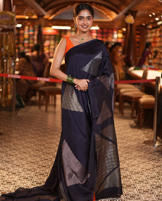 Borderless Navy Blue Chanderi Cotton Saree, Richly Detailed with Zari Triangle Motifs Steeped All Over Its Body, Highlighted by Grand Zari Rich Pallu, and Paired with a Matching Brocade Blouse
