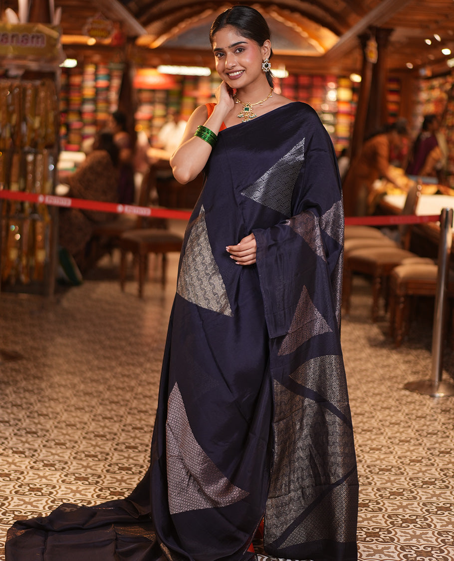 Borderless Navy Blue Chanderi Cotton Saree, Richly Detailed with Zari Triangle Motifs Steeped All Over Its Body, Highlighted by Grand Zari Rich Pallu, and Paired with a Matching Brocade Blouse