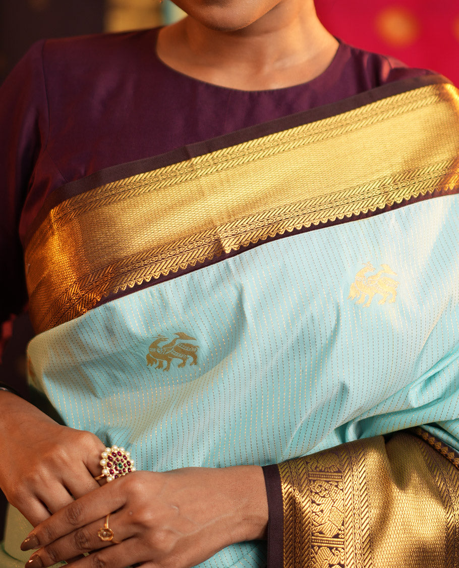 Blue Budget Silk Saree, Beautified with Zari Buttas and Zari Stripes on Its Body, Complemenetd by a Contrast Traditional Zari Border of Peacock-Elephant Designs, a Grandly Embellished Border, and Paired with a Contrast Blouse