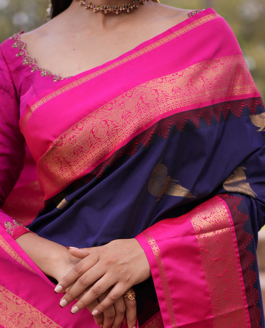 Navy Blue Parrot Motif Budget Silk Saree, a Contrast Rettai Pettu Border, and a Contrast Blouse