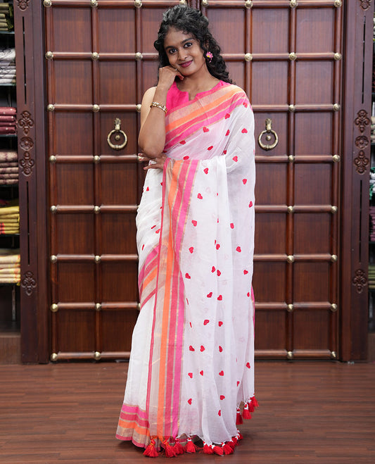 White Khadi Mul Cotton Saree, Artfully Designed Heart Motifs Embroidered on Its Body, Complemented by a Contrast Multi-Colored Striped Border, Pallu Steeped with Heart Motifs Embroidery, and Paired with a Matching Blouse