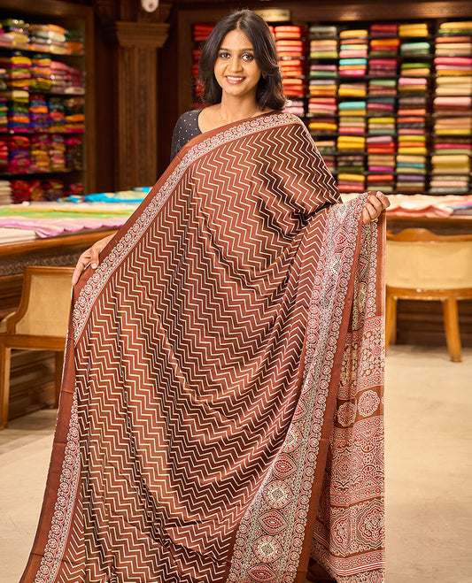 Brown zig zag digital printed design gajji silk saree with ajrak printed border & ajrak printed pallu along with printed blouse