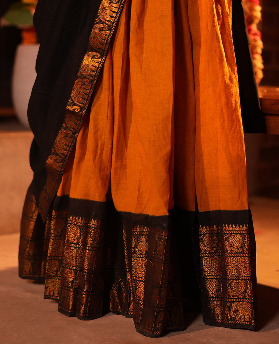 Mustard-Black Sungudi Cotton Half-Saree, Plain Skirt, Contrast Elephant-Peacock Border, Contrast Blouse, Contrast Elephant Motif Dhavani