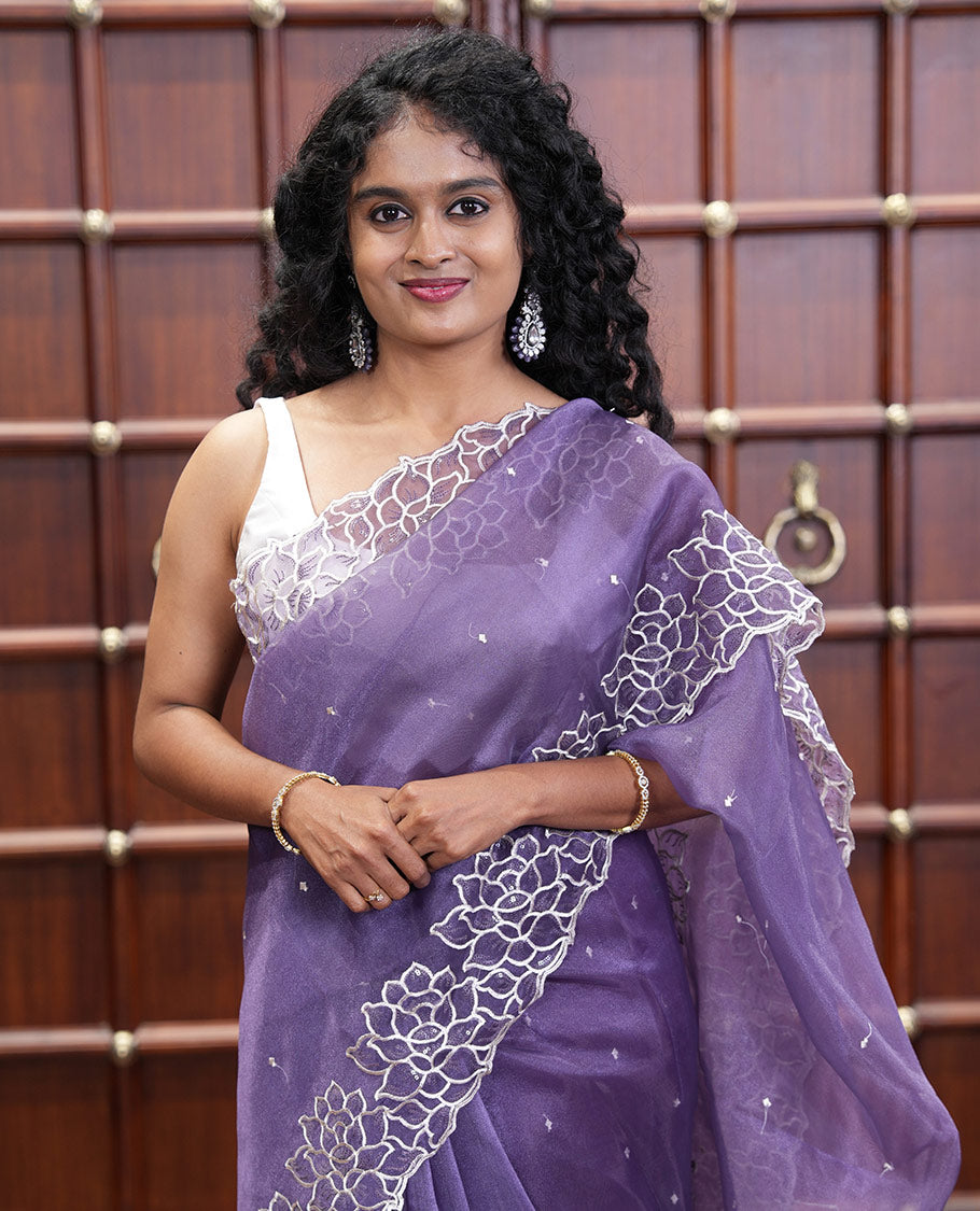 Lavender Organza Saree, Subtly Sparkled with Embroidered Buttas Across Its Body, Highlighted by a Scallop Floral Thread Embroidered Border, a Self-Pallu, and Paired with a Matching Blouse