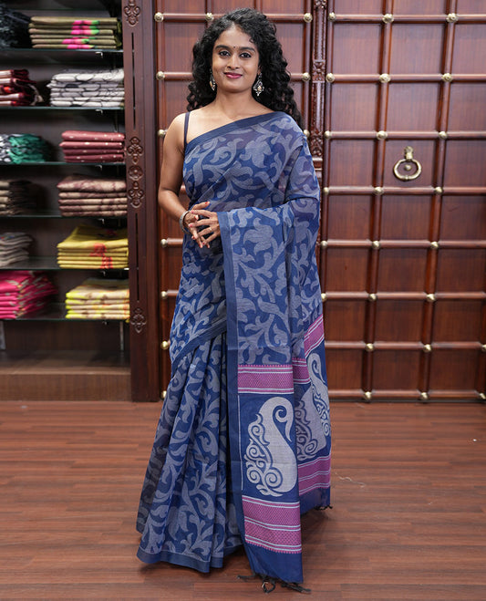 Borderless Blue Coimbatore Cotton Saree, Elevated with Floral Vine Print on Its Body, Self-Pallu Features Paisleys and Geometric Designs, and Paired with a Matching Blouse