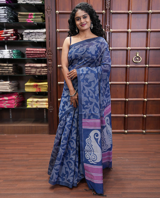 Borderless Blue Coimbatore Cotton Saree, Elevated with Floral Vine Print on Its Body, Self-Pallu Features Paisleys and Geometric Designs, and Paired with a Matching Blouse