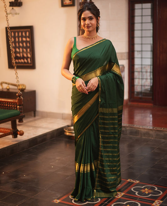 Bottle Green Semi-Mysore Silksaree, a Traditional Zari Border, a Matching Blouse