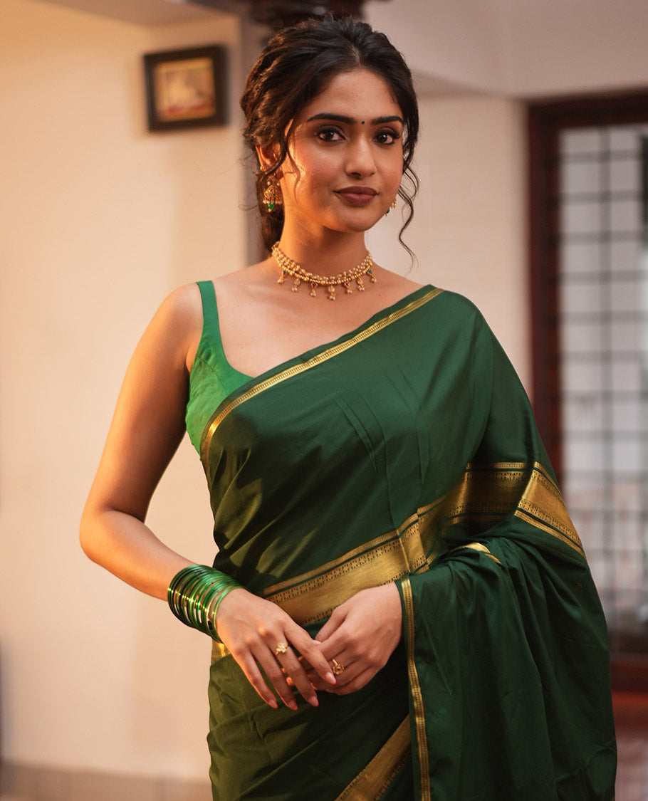 Bottle Green Semi-Mysore Silksaree, a Traditional Zari Border, a Matching Blouse