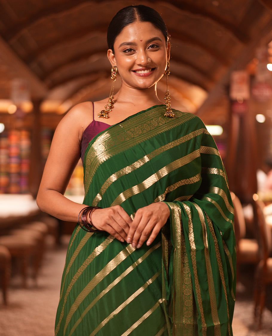 Bottle Green Zari Design Mysore Silk Saree, a Traditional Zari Border, Zari Striped Pallu, and a Matching Blouse