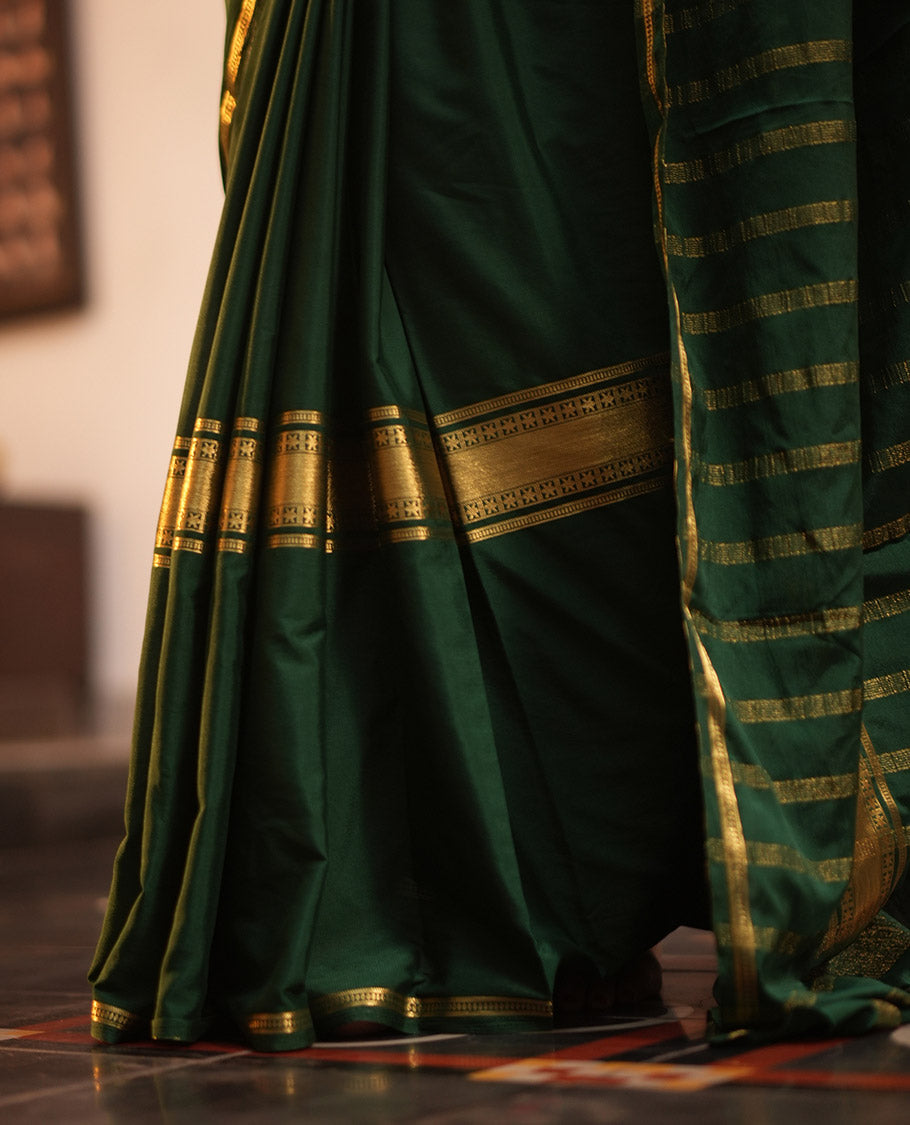 Bottle Green Semi-Mysore Silksaree, a Traditional Zari Border, a Matching Blouse