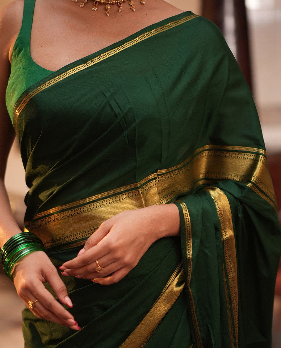 Bottle Green Semi-Mysore Silksaree, a Traditional Zari Border, a Matching Blouse
