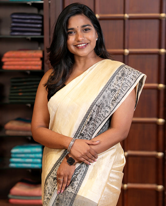 Cream art tussar silk saree with thread border & cheer pallu along with running blouse