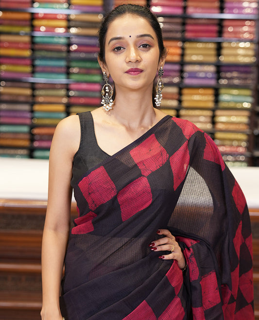 Black kota cotton saree with box type pathik printed border & printed pallu along with printed blouse
