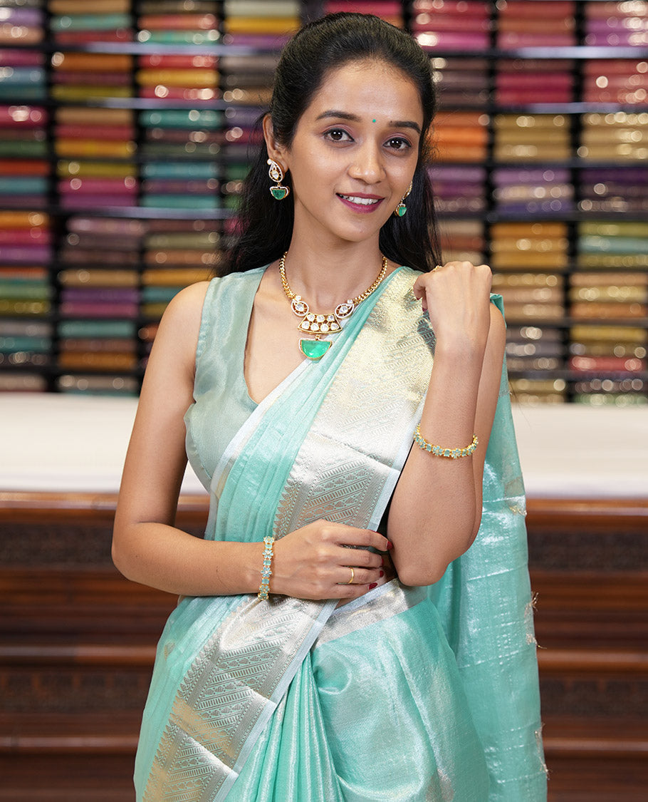 Sea green zari butta design banaras tissue silk saree with almond zari jacquard border & chit pallu along with running blouse