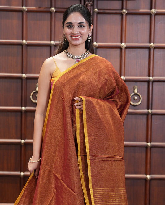 Borderless Maroon Plain Khadi Tissue Saree, a Self-Striped Pallu, and a Matching Blouse