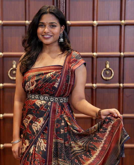 Black pochampally digital printed fendy crepe saree with swarovski stone, lace border & self pallu along with plain blouse