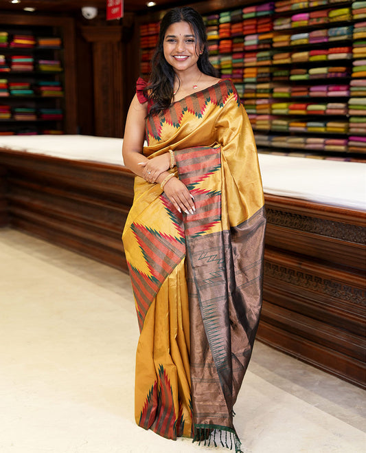 Gold plain tissue silksaree,contrast gold zari temple border, zari-rich traditional pallu, zari design blouse