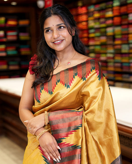 Gold plain tissue silksaree,contrast gold zari temple border, zari-rich traditional pallu, zari design blouse