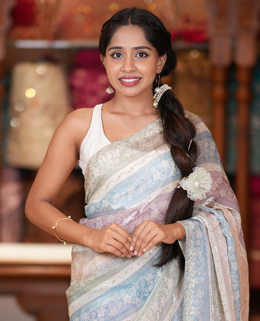 Blue Fendi Chiffon Saree, Dazzled with Multi-Color Floral Stripes and Glitterwork, a Stonework Border, a Matching Blouse